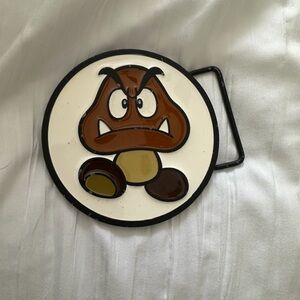 Vintage Nintendo Mario Goomba Black  belt buckle.